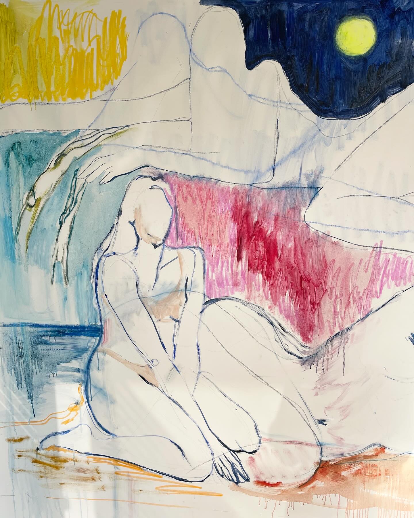 Two nude figures on unstretched cream canvas — one seated with her head bent, one reclining across the top of the picture. Blue contour line throughout, a crimson field between them, a deep blue night sky with a small yellow moon at the upper right, and orange washes running down to the lower edge.