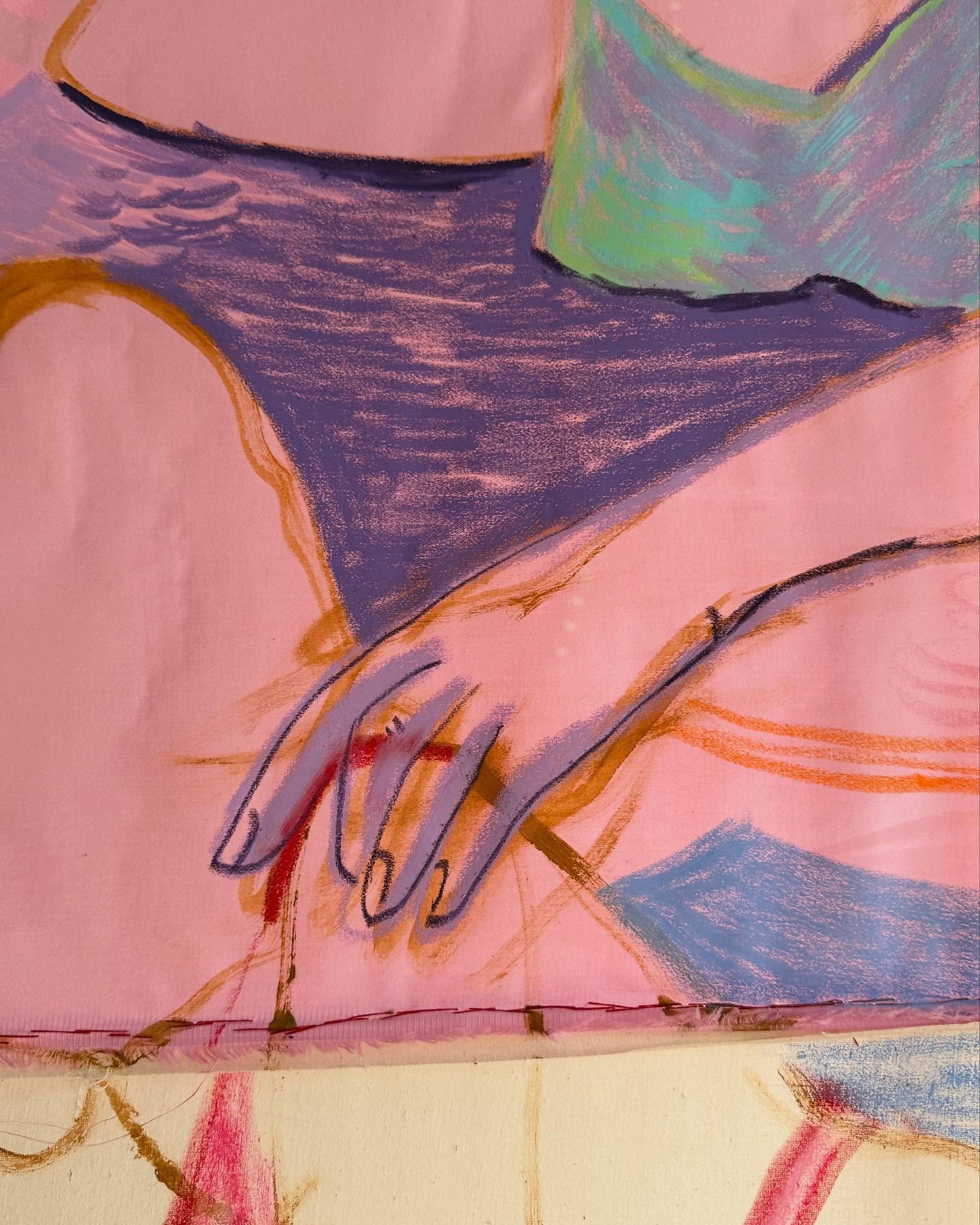 Detail of a painting on hot pink cotton: a hip and thigh worked in deep violet oil pastel, an arm laid across them and a hand drawn in a single dark line, with ochre, mint and turquoise marks around them. The raw stitched hem of the cloth runs along the bottom edge.