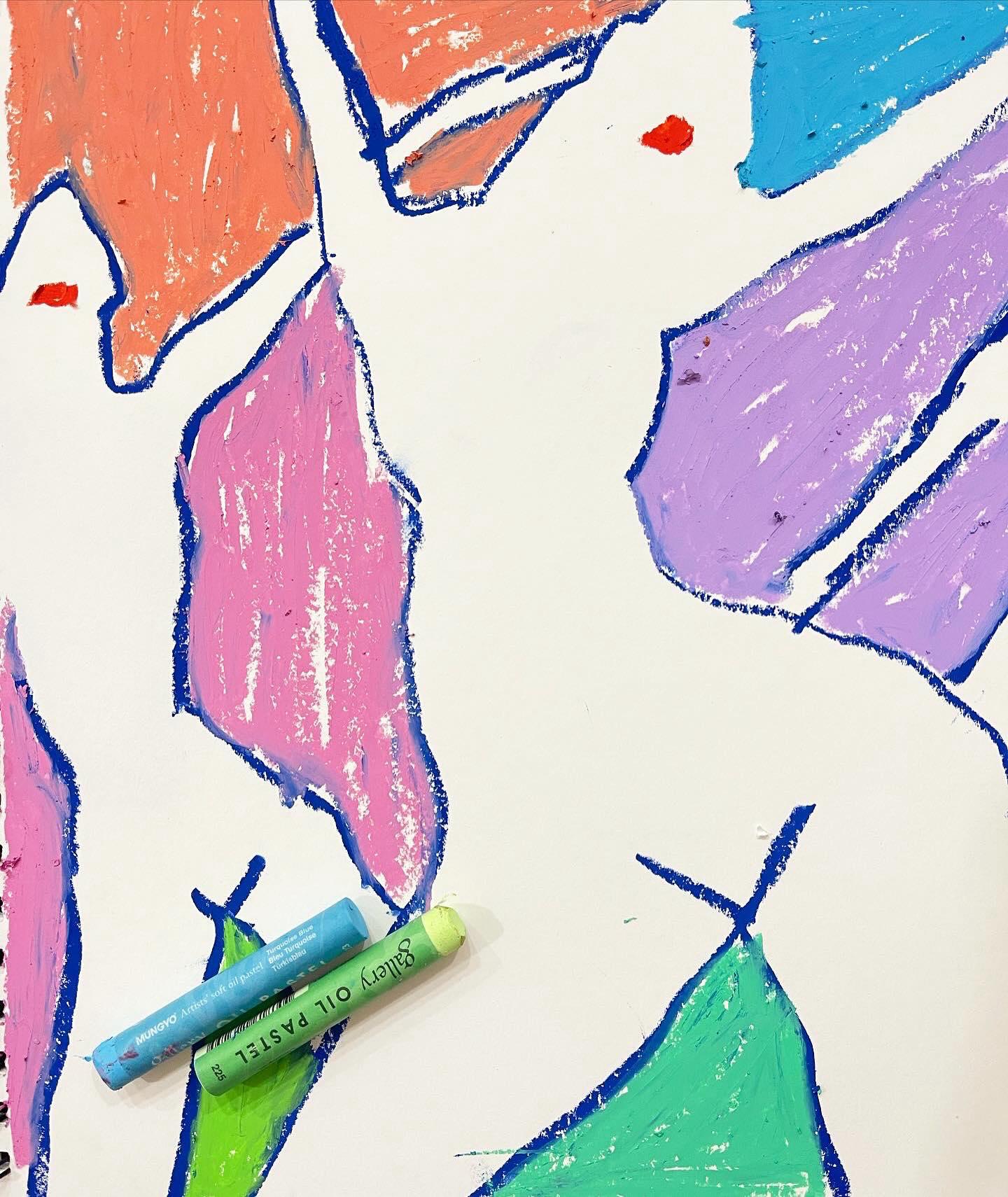 A detail of a drawing in oil pastel. Heavy cobalt-blue contour divides the white sheet, and the shapes between are filled flat with orange, coral, pink, lilac, turquoise and green; two small red marks sit in the bare white. Two oil pastel sticks, one turquoise and one green, lie across the paper at the lower left.